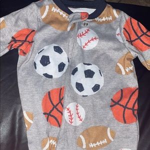 Carter’s baby boy sports onesie